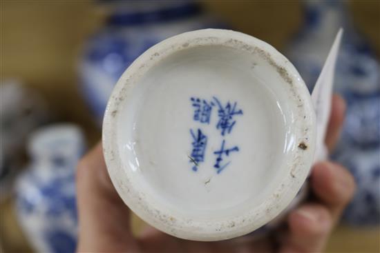 An Asian blue and white inverted pyriform jar and cover, a similar pair of smaller vases and two other items, H 25cm (largest)